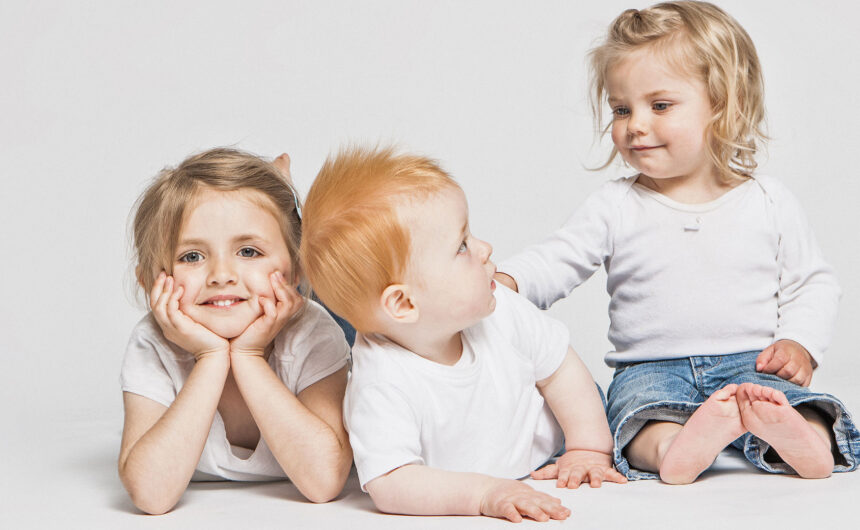 children-sitting-together-2022-03-07-23-52-53-utc Help Our Kids with School Uniforms